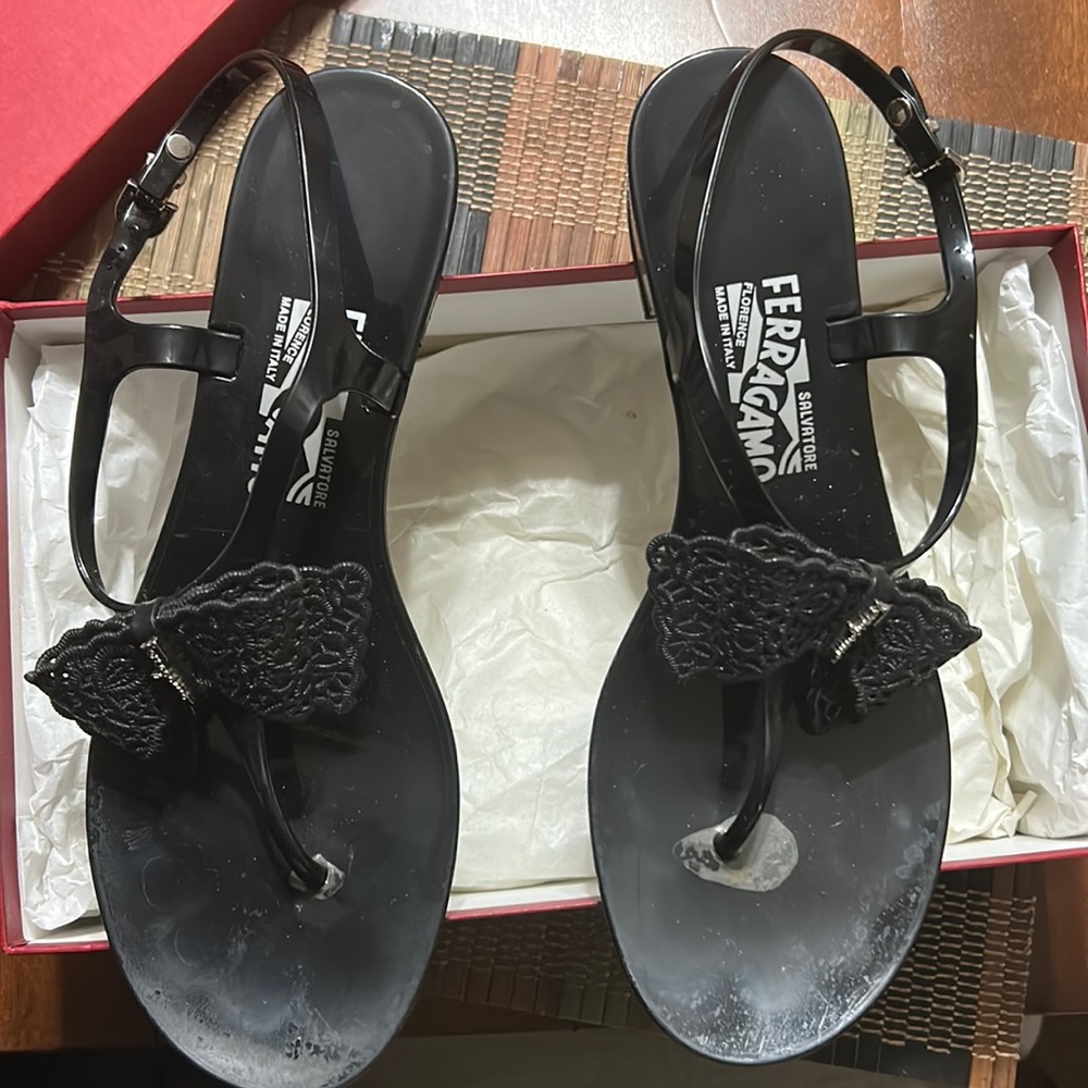 Black Ferragamo gel sandals with the mirrored heel. They cool. Size 9